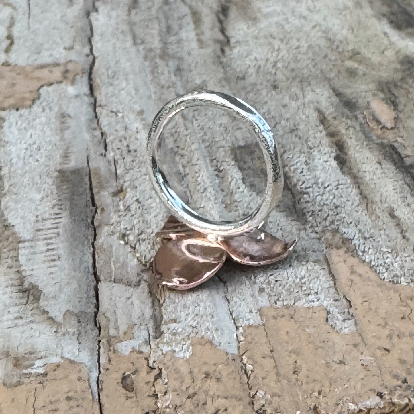 Back view of Marion floret ring showing textured sterling silver band and handcrafted details