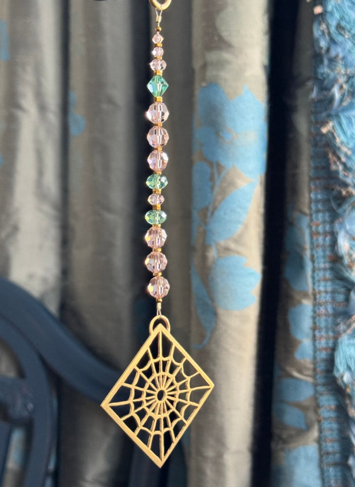 Brass cobweb suncatcher with vintage crystals